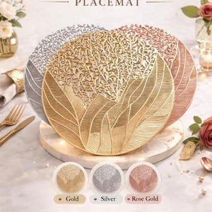 May include: Gold, silver, and rose gold placemats with a layered leaf design. The placemats are round and have an elegant metallic finish. The image also shows the text "Luxe Leaf Harmony" and "PLACEMAT".