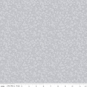 May include: A light gray fabric with a repeating pattern of small white circles and leaves.