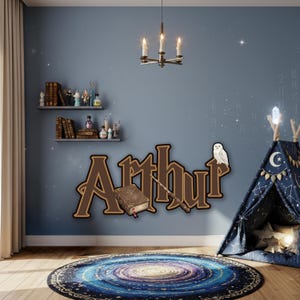 May include: A child's room with a blue wall featuring the name "Arthur" in brown lettering, a wand, and a book. A white owl sits on the letter "r". A galaxy-themed rug and a blue teepee with a crescent moon are also present.