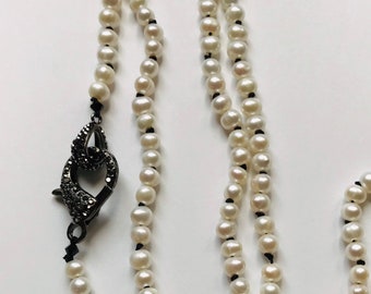 long white pearl necklace
