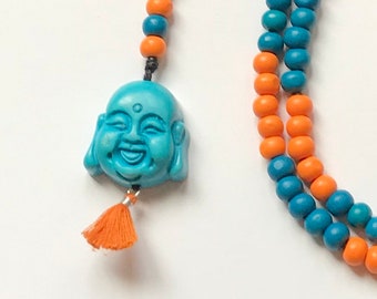 long beaded turquoise buddha necklace