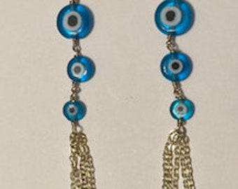 gold and turquoise evil eye tassel earrings
