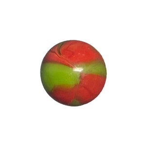 May include: A red and green glass marble with swirling patterns.