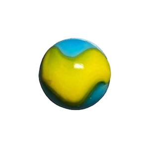May include: A blue and yellow glass marble with a swirl pattern.