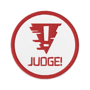 May include: Red and white embroidered patch with a red exclamation mark inside a red triangle and the text "JUDGE!" below.