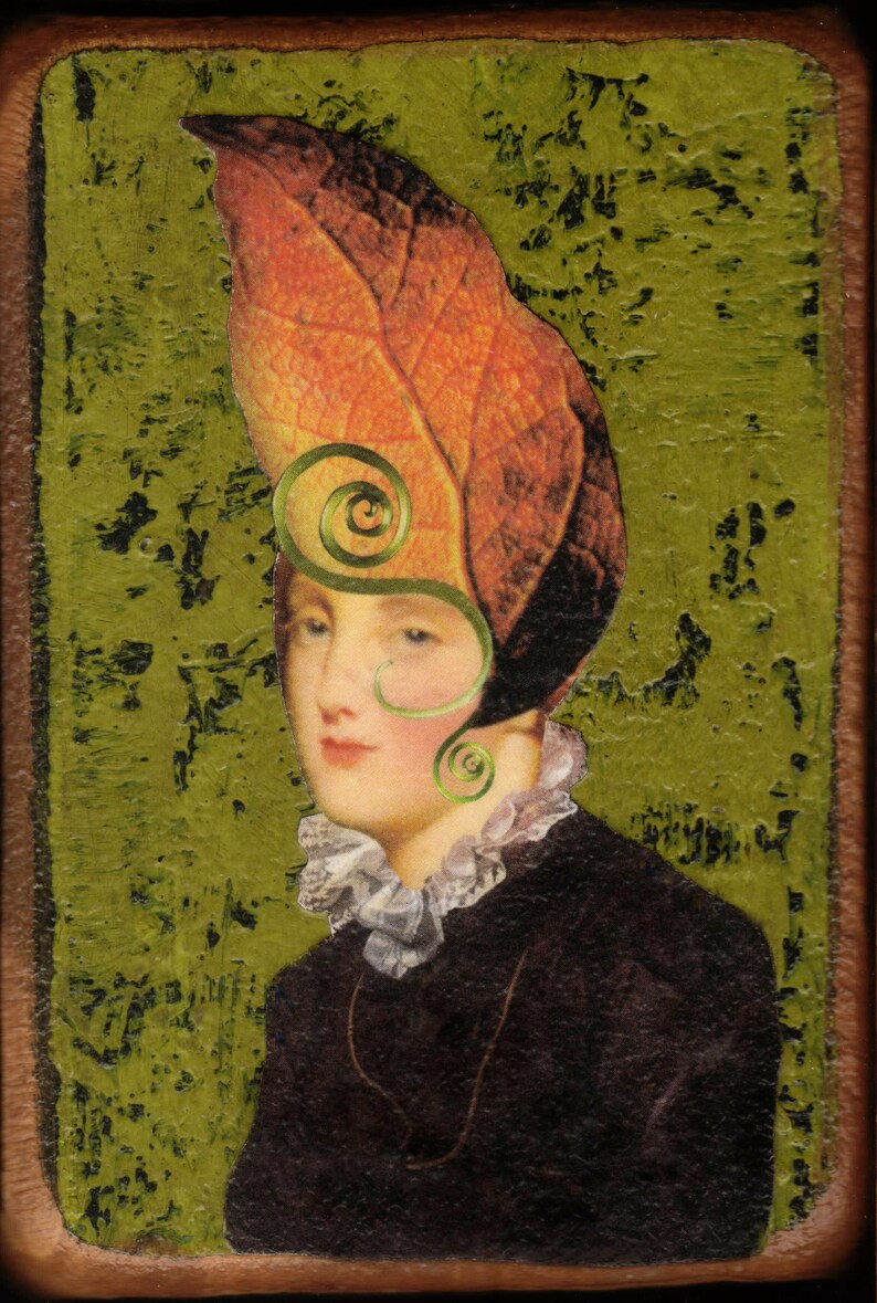 May include: A portrait painting of a person with a large orange leaf on their head. The leaf has green vines growing around it. The person is wearing a black dress with a white lace collar. The background is a textured green.