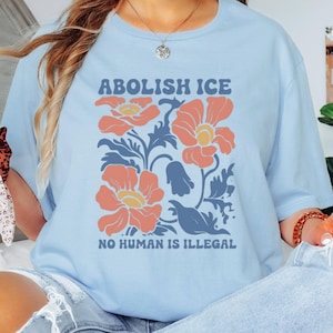 Floral Abolish ICE Human is Illegal Shirt, Political Resistance Shirt, Anti-Trump Activist Wear, No Human is Illegal Top, DACA Shirt
