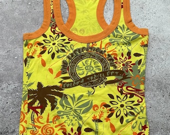 May include: Yellow tank top with a colorful floral print and the text "Dream Travel Dept." in a circle. The tank top has orange trim.
