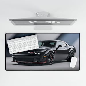 May include: Black Dodge Challenger SRT Demon muscle car with red accents on a black and gray desk mat with a white keyboard and a white mouse.