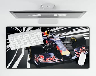 May include: A black and white racing themed mousepad with a red bull formula one race car in the center. The car is speeding down a track with white lines and a black background.