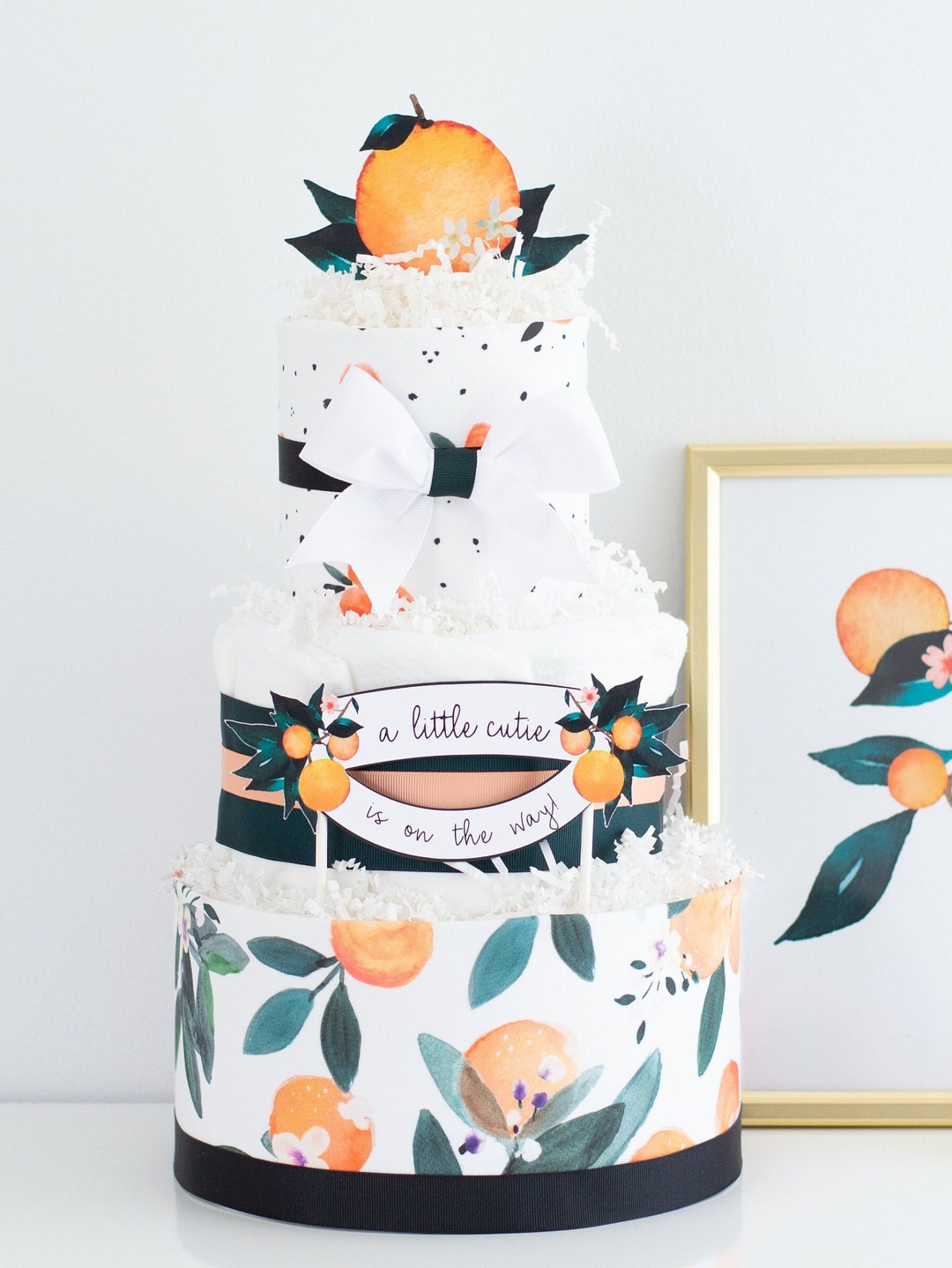 Adorable Heights Standing Baby Diaper Cake Clementine Diaper Cake