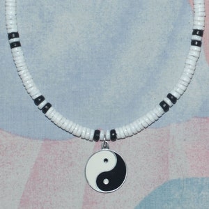 Native Treasure Smooth White Heishe Puka Shell Necklace with Yin Yang Pewter Pendant