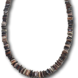 May include: A brown, black and white shell necklace. The necklace is made of flat, rectangular pieces of shell that are strung together.