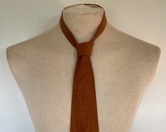 Vintage 1970s mustard suede embossed paisley pattern tie