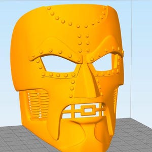 May include: A yellow plastic mask with a detailed design of rivets and a metal grid. The mask has two eye holes and a mouth opening.