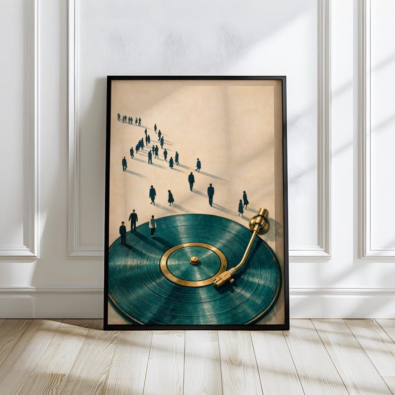 May include: Framed art print featuring a teal vinyl record with a gold tone center and arm. Silhouetted figures walk towards the record. The artwork is displayed on a white wall and wooden floor.