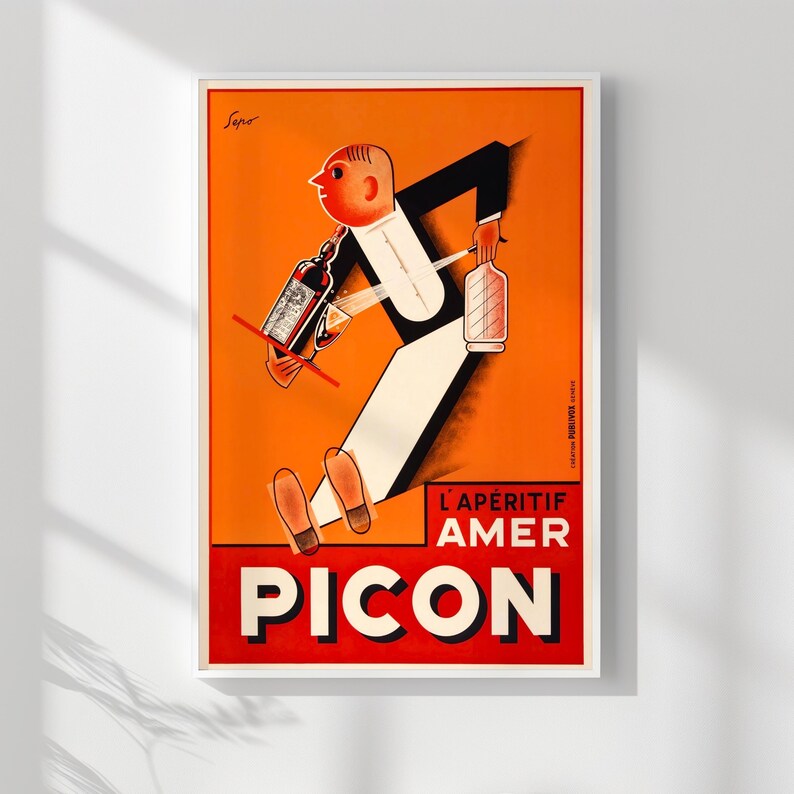 May include: Vintage advertisement poster for L'Aperitif Amer Picon. The poster features a stylized illustration of a man in a tuxedo carrying bottles and a glass of the aperitif. The background is orange with red and white text.