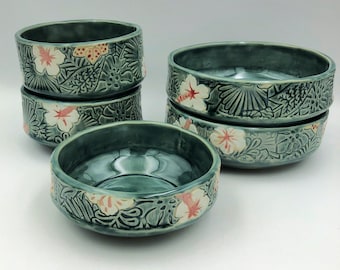 Slab built ceramic bowls with overall Rainforest green floral texture with pink and white flowers in 3 sizes