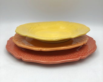 Set of 3 wabi sabi handmade ceramic plates with flower texture on the scalloped rim, in Poppy, Tangelo & Marigold glazes