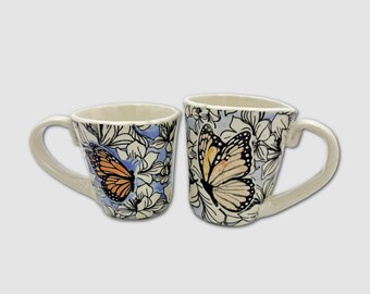 Handmade ceramic mug with butterflies and flowers