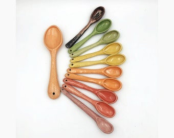 Handmade ceramic spoons with textured handles, glazed on both sides with hole in handle for hanging