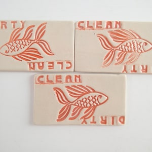 Dirty or Clean Dishes Kitchen Magnet - non-scratching backing, Fish imagery. Approx 1.5&quot; x 3&quot;