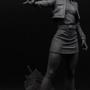 May include: A monochromatic gray anime-style figurine of a character with shoulder-length hair, wearing a cropped jacket, a t-shirt, a skirt with a belt, and boots. The figure stands in a dynamic pose with one arm extended forward on a rubble base.
