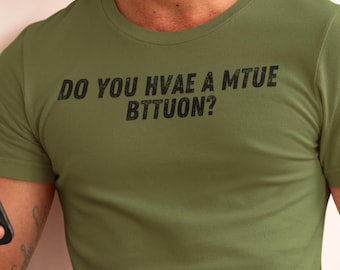 May include: A green t-shirt with the text "DO YOU HVAE A MTUE BITTUON?" printed in black.