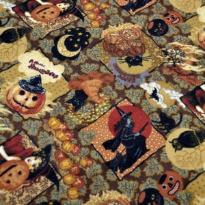 May include: A Halloween-themed fabric with a repeating pattern of pumpkins, witches, black cats, and bats. The design includes the text "A Merry Halloween" and is set against a brown and tan background.