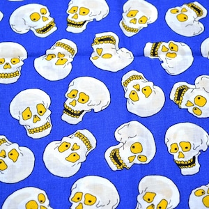 Halloween Fabric - Skeleton Heads on Blue - Cotton By the Half Yard
