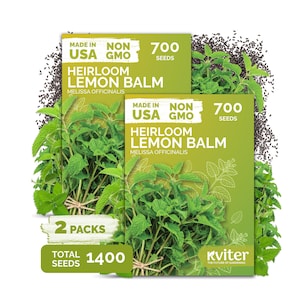 May include: Two packs of Heirloom Lemon Balm seeds, each containing 700 seeds, totaling 1400 seeds. The packaging is green with the text "Made in USA" and "Non GMO". The image shows fresh lemon balm sprigs.