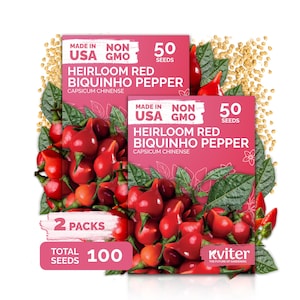 May include: Two packs of Heirloom Red Biquinho Pepper seeds, each containing 50 seeds, totaling 100 seeds. The packaging is pink with the text "Made in USA" and "Non GMO". The image also shows red peppers and green leaves.