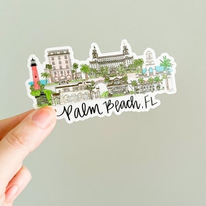 May include: A white sticker with a hand-drawn illustration of Palm Beach, Florida. The illustration features a lighthouse, several buildings, palm trees, and the text "Palm Beach, FL".