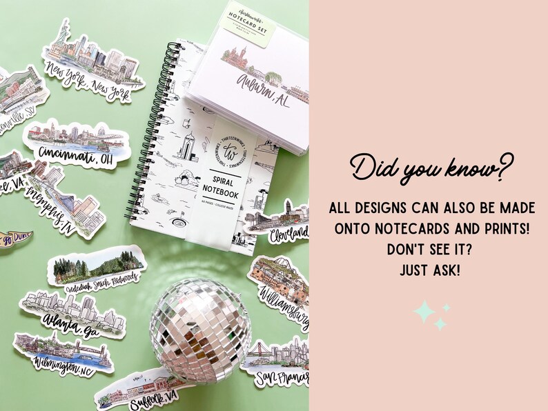 May include: A collection of stickers featuring city skylines, including New York, Cincinnati, Memphis, Atlanta, and San Francisco. The stickers are arranged on a green surface with a silver disco ball and a spiral notebook with a city skyline design. The notebook has the text "SPIRAL NOTEBOOK" on the cover. The text "Did you know? ALL DESIGNS CAN ALSO BE MADE ONTO NOTECARDS AND PRINTS! DON'T SEE IT? JUST ASK!" is written on a pink background.