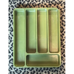 May include: A set of three ceramic nesting bowls in shades of blue, green, and white. The bowls have a speckled glaze and a simple, modern design. The largest bowl is approximately 15 cm in diameter.
