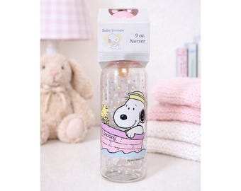 Biberón vintage Baby Snoopy de 266 ml (9 oz) VTG NIB Peanuts Woodstock Pink Boat de los años 90