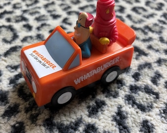 Coche de juguete antiguo de Whataburger con cuerda para tirar, juguete de la comida infantil Whataguy, funciona, Dr. Stale malvado