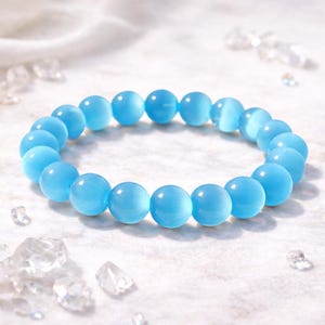 Blått kattögaarmband 10 mm kristallarmband Klarhet Lugn Fokus Stretch Ädelstenssmycken Statementgåva