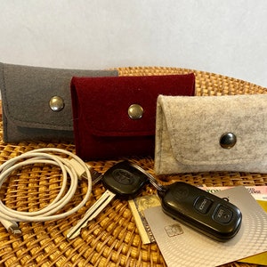 Cartera de mano de fieltro de lana