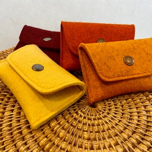 Cartera de mano de fieltro de lana