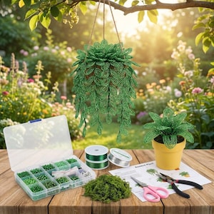 May include: A DIY craft kit featuring a hanging beaded plant and a potted beaded plant, a clear plastic organizer box filled with green beads, two spools of wire, a pile of green moss, pink-handled scissors, pliers, and an instruction sheet.