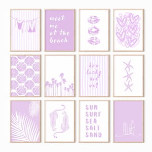May include: A set of twelve rectangular wall art prints in light purple and white, featuring illustrations of bikinis, palm trees, seashells, starfish, tigers, surfboards, hearts, and lips, with text including meet me at the beach and sun surf sea salt sand.