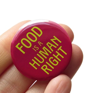 Przypinka „Żywność jest prawem człowieka”, odznaka sprawiedliwości społecznej