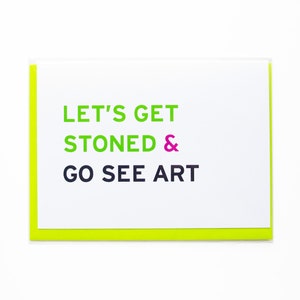 May include: A green and white card with the text "Let's Get Stoned & Go See Art" in black and pink lettering.