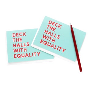 Tarjetas navideñas feministas adornan los pasillos con tarjetas navideñas de justicia social e igualdad
