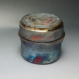Raku Fired Lidded Jar – Iridescent Handmade Ceramic Trinket Box with Lid – Unique Art Pottery Vessel by Rakun Ceramics
