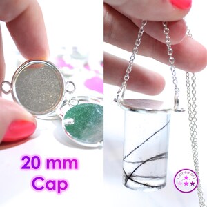 May include: A silver 20 mm round pendant cap with a clear resin insert. The pendant is attached to a silver chain. The text "Clone Mold" is visible in the lower right corner of the image.