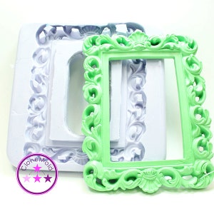 May include: A green, ornate picture frame with a detailed floral design. A white mould with a similar frame design is next to the green frame. The image also includes a logo with the text "CloneMold".