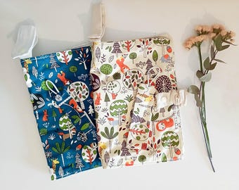 Coordinated jungle-themed wipes and diaper holder with pacifier holder, customizable with name embroidery