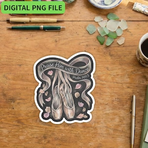 Puede incluir: Una pegatina con fondo negro presenta un dibujo de zapatillas de ballet y una cinta con el texto "Praise Him with Dance Psalm 149:3". La pegatina está rodeada de pétalos rosas.